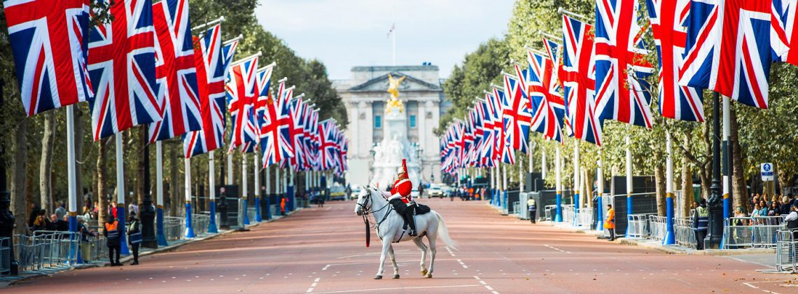 horse guard on Mall with british flags