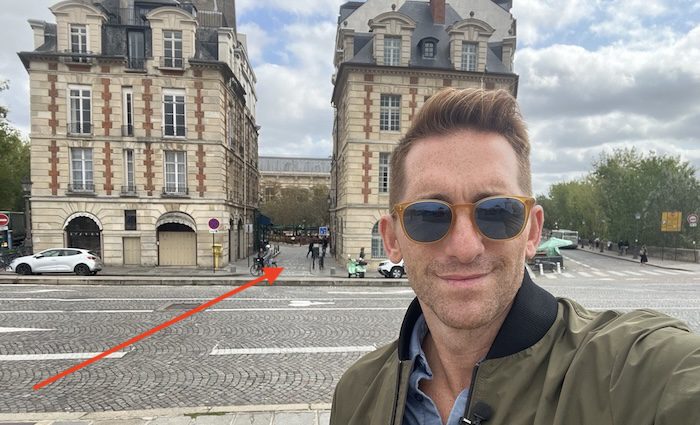 Sean Finelli in front of Place Dauphin in Paris on Pont Neuf Sept 2024