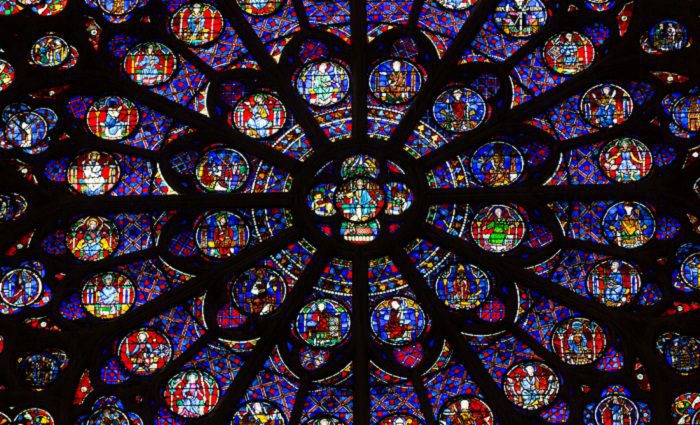 close up view of notre dame's stained glass rose window