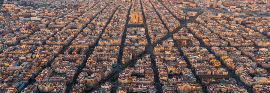 Panorama aerial view of Barcelona Eixample residencial district and famous basilica, Catalonia, Spain