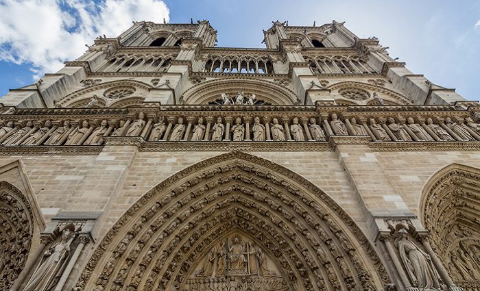 up close view of notre dame carvings and tower