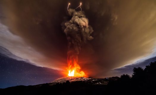 An Electrical storm over an erupting Etna.