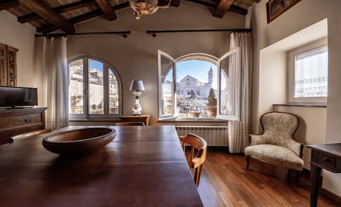 Dining room with view out the window over the Basilica of Santa Chiara