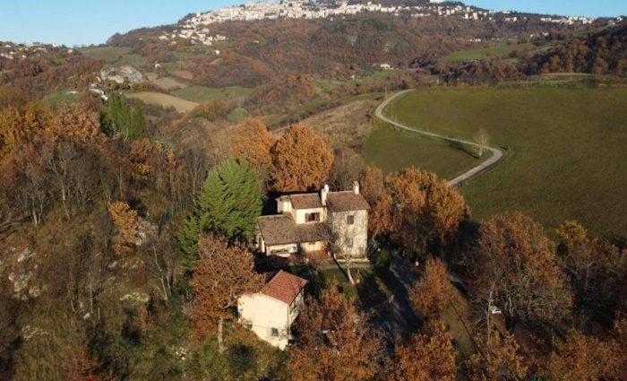 A view overlooking the villa with San Marino town in the background.