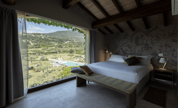 Bedroom of Tenuta San Masseo with view over Umbria to Assisi