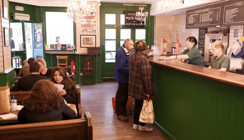 Locals eating in booths at Goddards at Greenwich