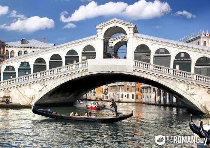 Rialto Bridge with gondola floating nearby