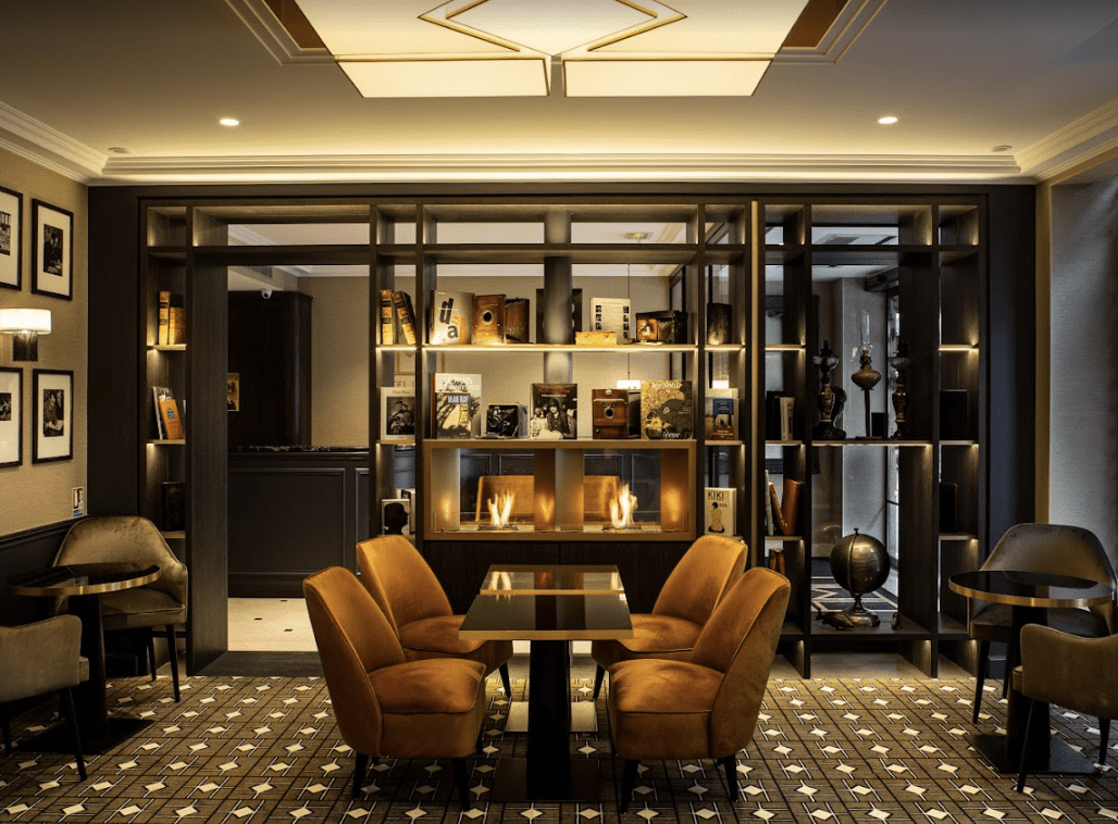 A bar and reading area with shelves of books.