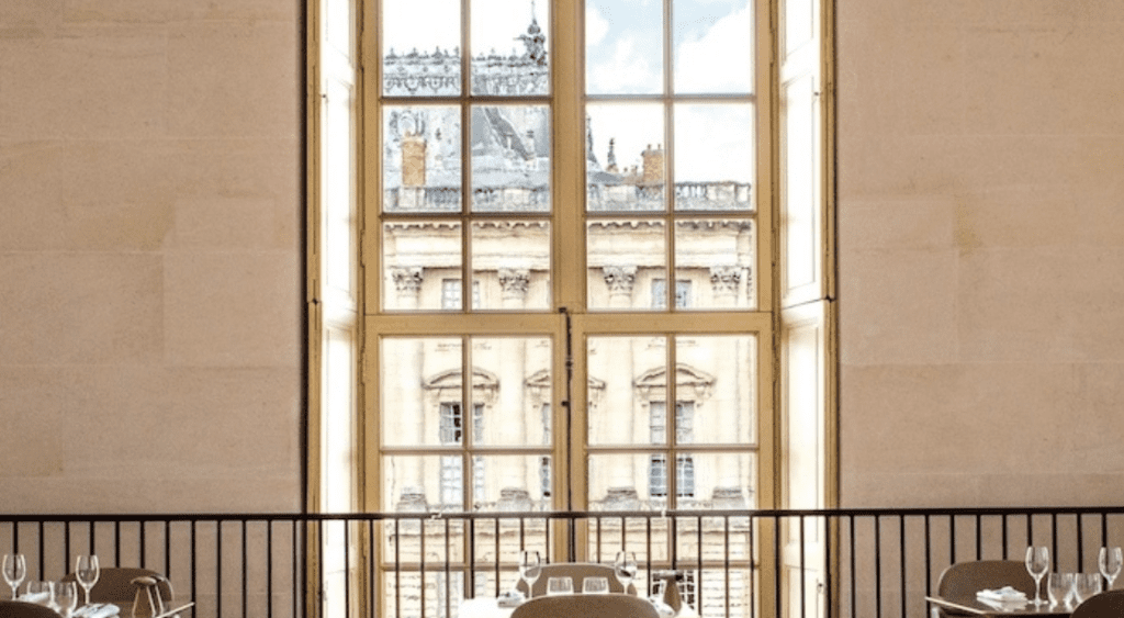 Large open window over looking Palace of Versaille.