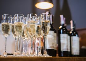 A glasses with champagne on the table at the restaurant. Preparation to celebrate