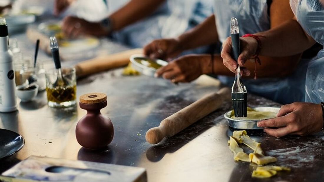 cooking spanakopita during an athens cooking class