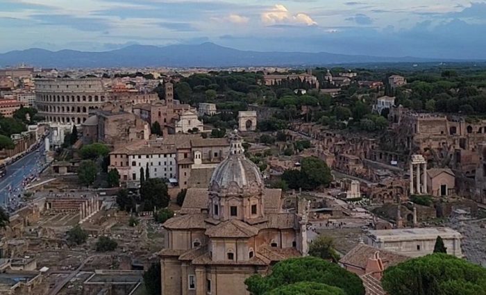 view of colosseum and roman forum from above