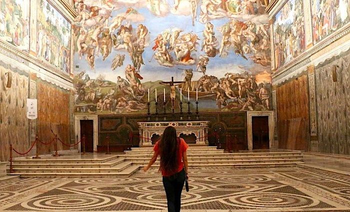 girl overlooking the sistine chapel