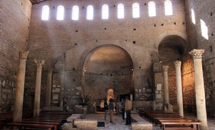 Visitors inside the Catacomb of Domitilla in rome